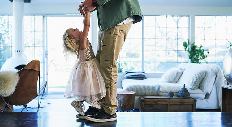Dad playing with daughter
