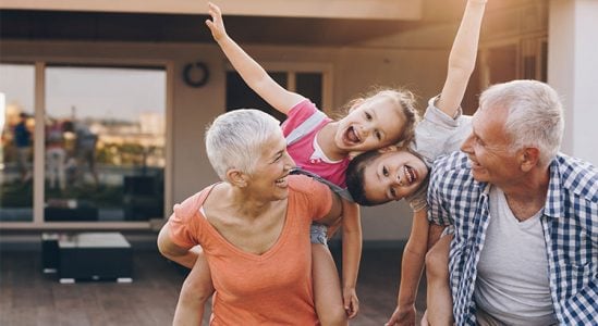 Senior couple with their grandchildren