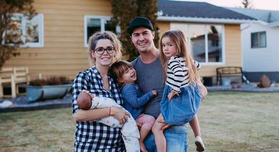 Family picture of young couple and their 3 kids