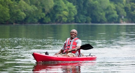 Senior man in a small boat