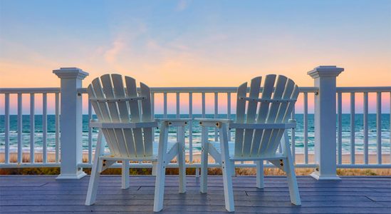 Chairs in front of a beach