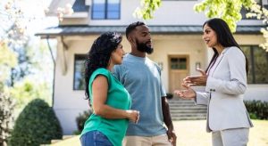 Professional discussing with young couple