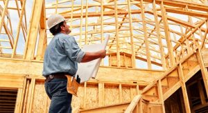 Engineer looking at a blueprint