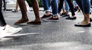 Several pairs of feet walking