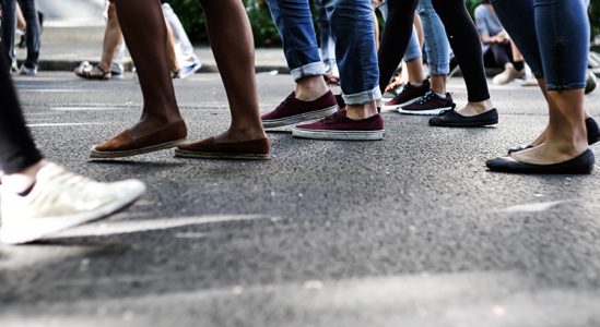 Several pairs of feet walking