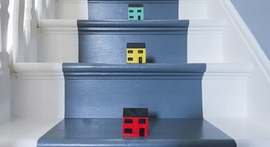 Stairs with toy model house