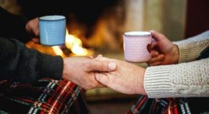Holding wants while holding cup of coffee