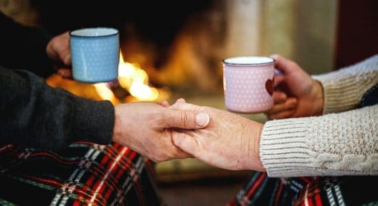 Holding wants while holding cup of coffee