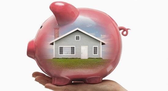 Piggy bank with a house print