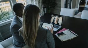 2 Professional doing video call with someone in the laptop