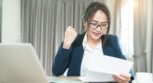 Woman looking a a paper