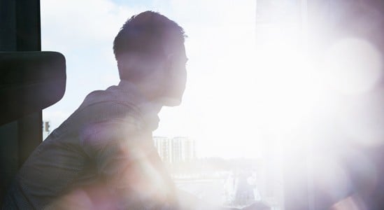 Silhouette of man while looking a sky