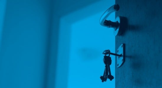 Key in a keyhole of the door