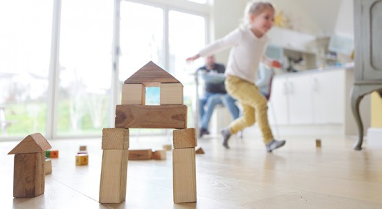 Kid playing and running in living room