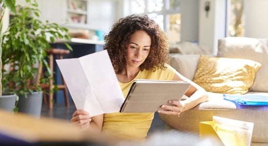 Woman looking at a paper