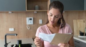 Woman reading a paper
