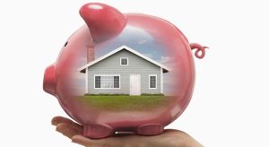 House reflected in piggy bank