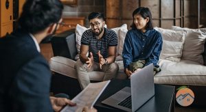 Professional discussing with young couple