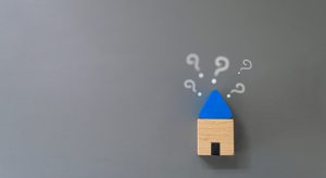 Wood House Model with Question mark on top