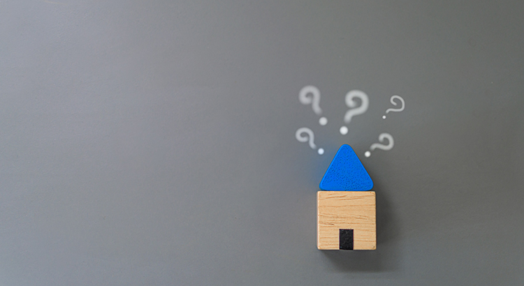 Wood House Model with Question mark on top