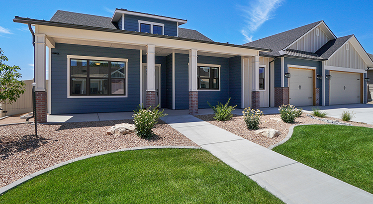 Modern Real Estate Front Exterior Blue and White Color Scheme with landscaping