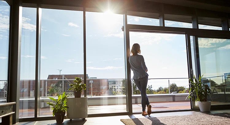 Woman leaning in the window